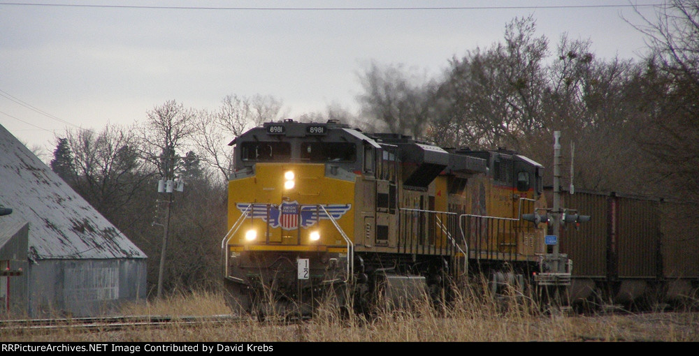 UP 8981 & 6724 rolling fast with empty coal cars.